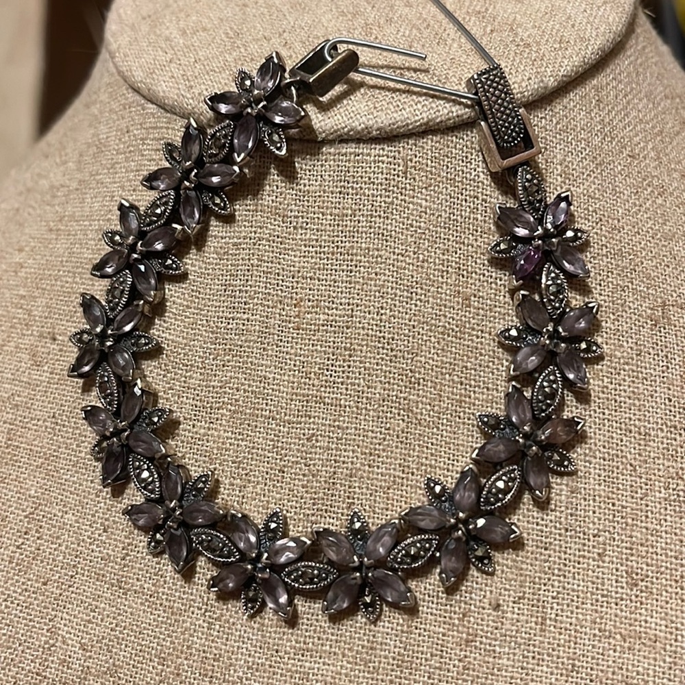 Sterling silver with amethyst and marcasite .